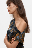 Flocked Asymmetric Top