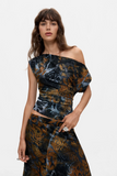 Flocked Asymmetric Top